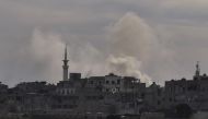 Smoke rises after Assad Regime carried out an airstrike at Duma town of Eastern Ghouta in Damascus, Syria on April 07, 2018. Mouneb Taim - Anadolu

