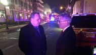 Turkish Consulate General in New York Ertan Yalcin (R) gets information from Michael McPartland (L), the Mayor of Edgewater, as firefighters try to extinguish the fire broke out at a Turkish restaurant in New Jersey, United States on April 9, 2018. (Vural