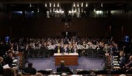 Facebook founder and CEO Mark Zuckerberg arrives to testify during a Senate Commerce, Science and Transportation Committee and Senate Judiciary Committee joint hearing about Facebook on Capitol Hill in Washington, DC, April 10, 2018. / AFP / POOL / Win Mc