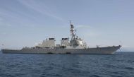 (FILES) In this file US Navy handout photo taken on March 21, 2016, USS Donald Cook (DDG 75), a guided-missile destroyer, anchoring off in Corfu, Greece, during a scheduled port visit. US NAVY