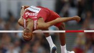 Mutaz Essa Barshim of Qatar in action in Mens High Jump Final at World Athletics Championships, London Stadium,  August 13, 2017. Reuters / Phil Noble