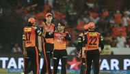 Sunrisers Hyderabad cricketer Rashid Khan (C) celebrates with teammates the wicket of Mumbai Indians Ben Cutting during the 2018 Indian Premier League (IPL) Twenty20 cricket match between Sunrisers Hyderabad and Mumbai Indians at the Rajiv Gandhi Internat