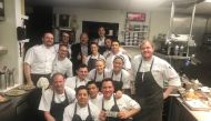 Look at those wide grins from Boka workers after each of the 17 received a $100 tip on Sunday. (Boka Restaurant Group photo) 