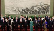 Chinese President Xi Jinping poses for a group photo with other delegates and guests at the welcoming banquet for the Belt and Road Forum in Beijing on May 14, 2017. (AFP / Jason Lee)