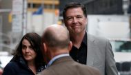 Former FBI Director James Comey arrives for a taping of 