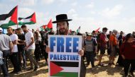 A demonstrator takes part in a rally of Israeli Arabs calling for the right of return for refugees who fled their homes during the 1948 Arab-Israeli War, near Atlit, Israel April 19, 2018. Reuters/Ammar Awad