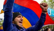 Armenian opposition supporter shouts during a rally in central Yerevan on April 21, 2018, held to protest former president Serzh Sarkisian's election as prime minister that saw dozens of people arrested. AFP / Vano SHLAMOV