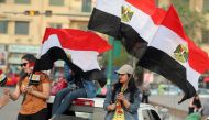 Supporters of Egyptian President Abdel Fattah al-Sisi celebrate in Tahrir square, Cairo following his re-election for a second term on April 2, 2018. (AFP / Mohamed El-Shahed) 