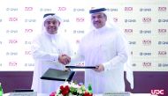  Ali Ahmed Al Kuwari (left), CEO, QNB Group; and Ibrahim Jassim Al Othman, President and CEO, UDC, shake hands after signing the LoI on financing the development of Gewan Island project.
