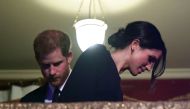 Britain's Prince Harry and Meghan Markle arrive for a special concert 