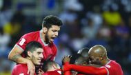 Al Duhail players celebrate after scoring against Al Gharafa in the semi-final of Qatar Cup on Sunday.  