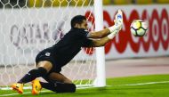 Mesaimeer goalkeeper blocks a penalty kick during their Emir Cup second round match against Al Ahli at Qatar SC Stadium yesterday. 