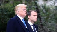 US President Donald Trump walks with French President Emmanuel Macron at Mount Vernon, the estate of the first US President George Washington, in Mount Vernon, Virginia, April 23, 2018. / AFP / Ludovic MARIN 