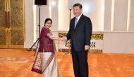 Indian Foreign Minister Sushma Swaraj shakes hands with Chinese President Xi jinping before a meeting at the Great Hall of the People in Beijing, China April 23, 2018. Naohiko Hatta/Pool via REUTERS