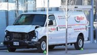 A damaged van seized by police is seen after multiple people were struck at a major intersection northern Toronto, Ontario, Canada, April 23, 2018. REUTERS/Saul Porto