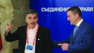 Greek Finance Minister Euclid Tsakalotos (left) speaks to Bulgaria’s Finance Minister Vladislav Goranov as he arrives for the Informal meeting of economic and financial affairs ministers (ECOFIN) in Sofia, Bulgaria, yesterday.