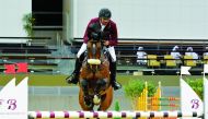 Ahmed Mohammed Al Badi guides Latino 291 over an obstacle during Round 1 of the Medium Tour of the final  leg of Hathab Equestrian Tour yesterday.