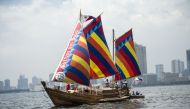 A traditional Philippine wooden boat known as 'balangay' sets sail from Manila to China on April 28, 2018.  AFP / NOEL CELIS