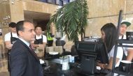 Commercial Bank Group CEO Joseph Abraham visiting one of the counters.