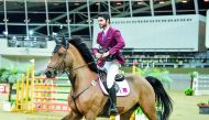 Nasser Al Ghazali, winner of the Big Tour of the final leg of the Hathab Equestrian Tour, arriving at the podium astride Quel Homme.
