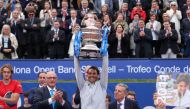 Spain's Rafael Nadal celebrates with the trophy after winning the final against Greece's Stefanos Tsitsipas REUTERS/Albert Gea
