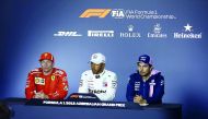 Lewis Hamilton (C) of Mercedes, Kimi Raikkonen (L) of Ferrari and Sergio Perez (R) of Force India hold a press conference at the end of the 4th round of Formula One World Championship Azerbaijan Grand Prix, on April 29, 2018 in Baku, Azerbaijan. (Resul Re