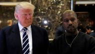 FILE PHOTO: US President-elect Donald Trump and musician Kanye West pose for media at Trump Tower in Manhattan, New York, U.S., December 13, 2016. REUTERS/Andrew Kelly/File Photo