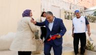 Simon Salama, a Tunisian Jew and 52-year old candidate from the Islamist Ennahda Party in the municipal elections, distributes leaflets in Monastir, Tunisia May 3, 2018. Picture taken May 3, 2018. REUTERS/Zoubeir Souissi