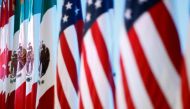 File photo of flags of Canada, Mexico and the US are seen before a joint news conference on the closing of the seventh round of NAFTA talks in Mexico City, Mexico March 5, 2018. REUTERS/Edgard Garrido