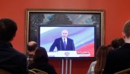 Journalists watch a ceremony to inaugurate Vladimir Putin as President of Russia at a press centre in Moscow, Russia May 7, 2018. Reuters/Sergei Karpukhin