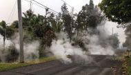 Steam rises from fissure 9 on Moku Street in the Leilani Estates subdivision, in Hawaii, U.S. May 7, 2018. Picture taken on May 7, 2018. USGS