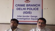 Two men dressed in 'space suits' who were arrested for alleged fraud after claiming to work for NASA are presented at a police station in New Delhi on May 9, 2018. AFP photo / Delhi Police