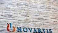 A Novartis logo is pictured on one of its its headquarters (Reuters/Vivek Prakash) 