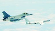 Republic of China (Taiwan) Air Force F-16 fighter aircraft (L) flying alongside a Chinese People's Liberation Army Air Force (PLAAF) H-6K bomber that reportedly flew over the Bashi Channel, south of Taiwan, and over the Miyako Strait, near Japan's Okinawa