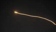 An image released by the Syrian Arab News Agency (SANA) early on May 10, 2018 purportedly shows what the official news agency said was air defence systems intercepting Israeli missiles over Syrian airspace, without specifying the location. AFP PHOTO / SAN