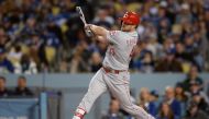 Cincinnati Reds center fielder Scott Schebler (43) watches his three-run home run during the sixth inning against the Los Angeles Dodgers at Dodger Stadium. Orlando Ramirez/USA TODAY Sports