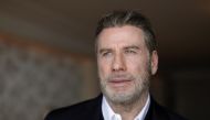 John Travolta poses during a rendez-vous for the film Gotti, 71st Cannes Film Festival - Cannes, France, May 14, 2018. Reuters/Eric Gaillard