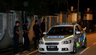 Police arrive outside former prime minister Najib Razak's residence in Kuala Lumpur, Malaysia May 16, 2018. Reuters/Lai Seng Sin