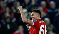 Liverpool's Trent Alexander-Arnold celebrates after a teammate’ scores, April 24, 2018. Reuters/Phil Noble