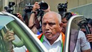 India's ruling Bharatiya Janata Party (BJP) leader and former Chief Minister of the southern state of Karnataka B. S. Yeddyurappa leaves to meet the state governor to stake claim to form the government, in Bengaluru, India, May 16, 2018. Reuters/Abhishek 