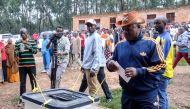 Burundi President Pierre Nkurunziza casts his ballot at a polling centre during the constitutional amendment referendum at School Ecofo de Buye in Mwumba commune in Ngozi province, northern Burundi, May 17, 2018. REUTERS/Evrard Ngendakumana