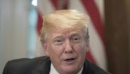 US President Donald Trump makes remarks at a roundtable meeting on sanctuary cities May 16, 2018, in the Cabinet Room at the White House in Washington, DC. / AFP / Jim WATSON