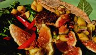 Fig and dried fruit salsa with a turkey burger and house made whole wheat pita bread prepared by chef Christine Denney at Oaks at Ojai (Reuters) 