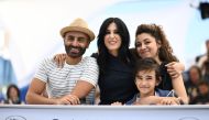 (FromL) Screenwriter Jihad Hojeily, Lebanese director and actress Nadine Labaki, screenwriter Marianne Katra and Syrian actor Zain al-Rafeea pose on May 18, 2018 during a photocall for the film 