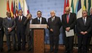 Ambassador of Kuwait to the United Nations Mansour Al-Otaibi (C). Drew Angerer/AFP
