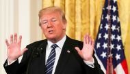 FILE PHOTO: US President Donald Trump gestures as he delivers remarks during the Prison Reform Summit at the White House in Washington, DC, US, May 18, 2018. REUTERS/Kevin Lamarque/File Photo
