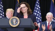 Gina Haspel prepares to speak while flanked by U.S. President Donald Trump (L) and Vice President Mike Pence, after she was sworn in as CIA director during a swearing-in ceremony at agency headquarters, May 21, 2018 in Langley, Virginia. Mark Wilson/AFP 