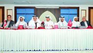 Sheikh Dr. Khalid bin Thani bin Abdullah Al Thani, QIIB Chairman and Managing Director (third left); Sheikh Abdullah bin Thani bin Abdullah Al Thani, Vice-Chairman of QIIB (second left), and Dr Abdulbasit Ahmed Al Shaibei (centre), CEO of QIIB; with other