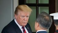 US President Donald Trump bids farewelll to South Korea's President Moon Jae-in (R) after meetings at the White House on May 22, 2018 in Washington, DC. AFP / Mandel Ngan