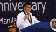 Philippine President Rodrigo Duterte delivers his speech during the 120th Philippine navy anniversary celebration in Manila on May 22, 2018. / AFP / TED ALJIBE